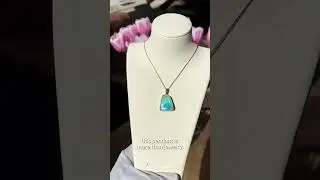 Fall in Love With Every Turn of this Gem #australianopal #gemstonejewelry #opalpendant #finejewelry
