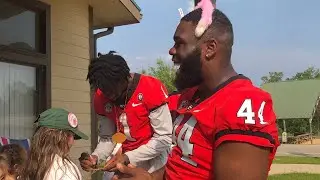 UGA football players surprise kids at Camp Rainbow