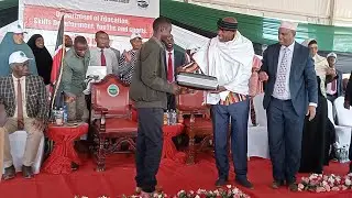 Marsabit County Top KCSE students being awarded by Minister for Education at Moyale