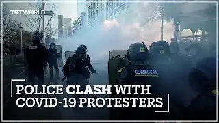 Paris police use tear gas on protesters who oppose COVID-19 rules