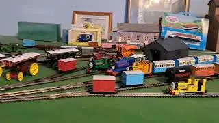 Bachmann Rusty pulling 4 Brown 4 red slate wagons and blue brakvan 
