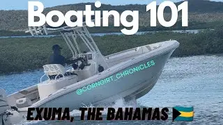 Dad teaches son how to operate the boat in Exuma, The Bahamas 🇧🇸 