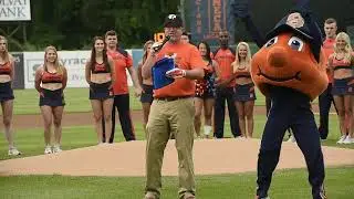 Syracuse Orange 's Dino Babers throws out first pitch at Syracuse Chiefs game