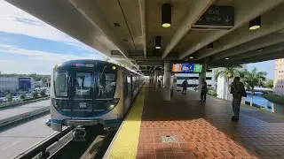 Miami Metrorail Northbound Orange Line train ride from Dadeland North to Government Center Station.