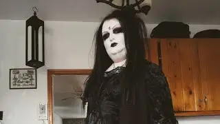 A Goth making Baked Macaroni And Cheese 