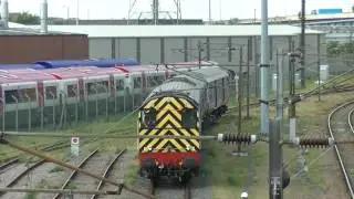 Wabtec Rail 08853 shunting ScotRail 318257 at Doncaster West Yard