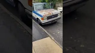 Revving engine of old ford pickup truck