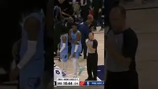 Fans try to run on the court in the middle of the Timberwolves-Grizzlies game