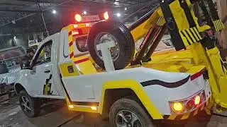 Tata yodha1700 on fab.safe car tow hydraulic underlift crane manufacturer by Kamal crane