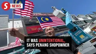 Hardware shopowner says upside-down flag is unintentional and regretful