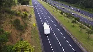 A Bird's-Eye View of a Scanvogn Trailer On The Road