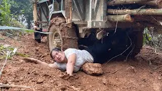 Transporting wood on a steep road in a farm vehicle is extremely dangerous for the girl.