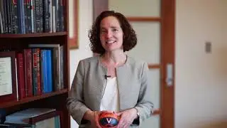 Dean Risa Goluboff Cheers on the Hoos