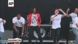 First Lady Michelle Obama shows off her dance moves at the annual White House Easter egg roll as par