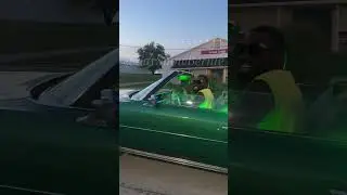 Green &lsquo;73 Caprice Classic on gold Daytons departing MidwestFest 9.