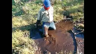 051 mud: Sneakers Jeans and Shirt in the Forest Mud