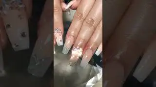 Stunning White Ombre Nail Art with Rhinestones and Glitter Accents#nailart #ombre nails