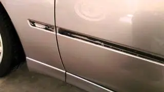 How to remove double sided tape from door trim