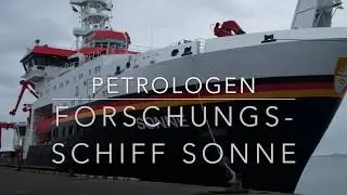 Petrologists at work on research vessel Sonne, Pacific Ocean.