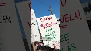 Anti-war protesters rally outside jail holding Maduro