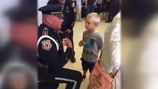 Dakota Pitts receives his father's badge