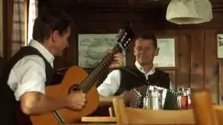 Traditional Musicians at mountain hut Purtschellerhaus