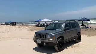 Jeep Patriot 4x4 lifted at the beach