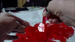 Stained Glass Candy with snow cone syrup( DO NOT LETS KIDS COOK!! HOT LIKE LAVA!)