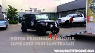 Service de livraison de v&eacute;hicule par remorque ferm&eacute;e- Joliette Dodge Chrysler Jeep Fiat