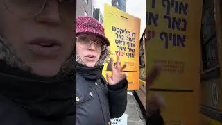 Plakat uliczny w języku jidysz przeciwko internetowi