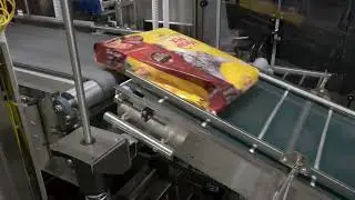 Polypack PH Shrink Bundler Stacking & Bundling Four Bags of Pet Food | www.ProPac.com