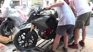 unboxing the DIMOTO DY200 motorcycle 2021