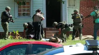 Raw Video: Law enforcement responds to Columbus, GA house, makes a multiple arrests