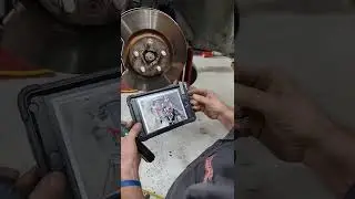 Brake inspection on a Land Rover.