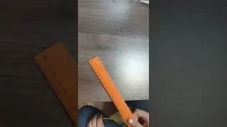 Тhe sound of a plastic line hitting an MDF desk
