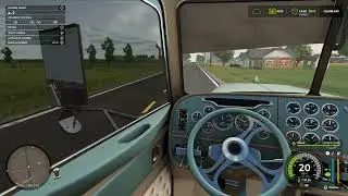 driving a Peterbilt to the silo on fs25