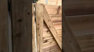 Saloon doors on cedar horizontal fence