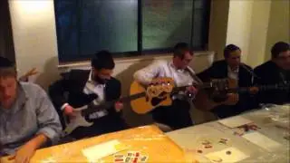 Kumzitz at the Oorah motzei shabbos learning program in Yerushalayim.