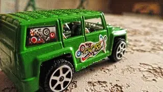 Plastic Toy Cars Falling in an Empty Box