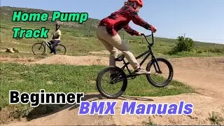 Beginner BMX Rider tries Pump track Manuals | Carla Learns to ride Dirt Jumps #1