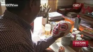 Chinese New Year: Making money from monkey masks
