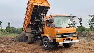 MOBIL TRUK BONGKAR MUATAN CADAS