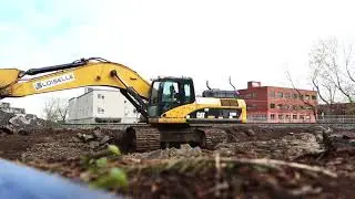Free stock video background loop of building construction site daylight