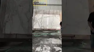 Gold Calacatta marble cut into countertops from EDG Stone #edgstone #goldcalacatta #calacattagold