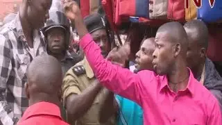 Shop owners and hawkers face off in downtown Kampala