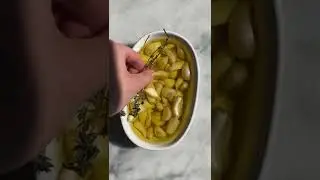 Roasting garlic cloves in olive oil allows them to become mild, caramelized, and tender