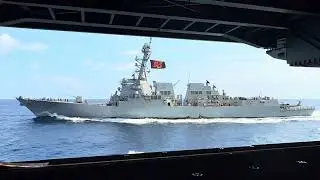 Close pass by a smaller ship