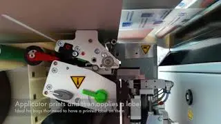 Rollbag R3200 automatic poly bagger with integrated inline label printer applicator