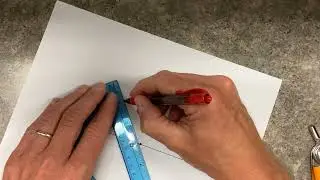 Construction of a perpendicular line through a point off the line