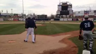 Shaun Larkin, new manager of the Lake County Captains, leads infield drills at Classic Park on April
